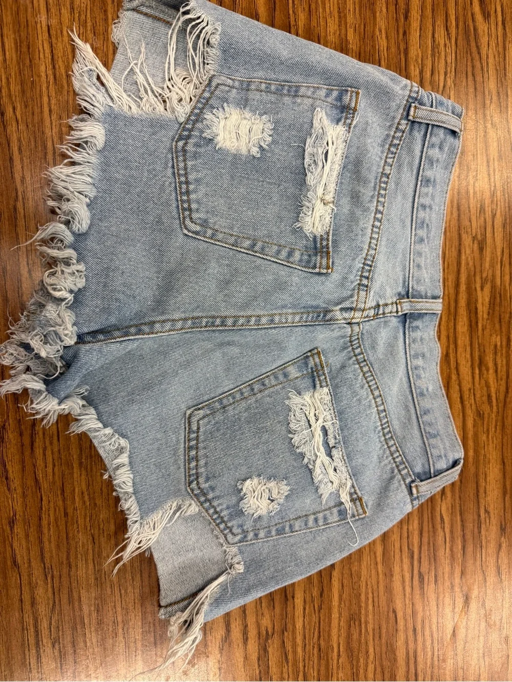 John Galt Jean shorts with intentional distressing and button fly
